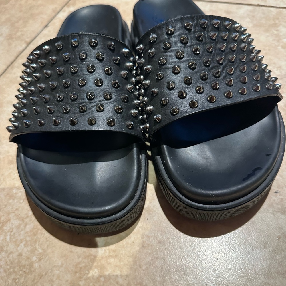 Christian louboutin slides used in very good shape new they go for 575